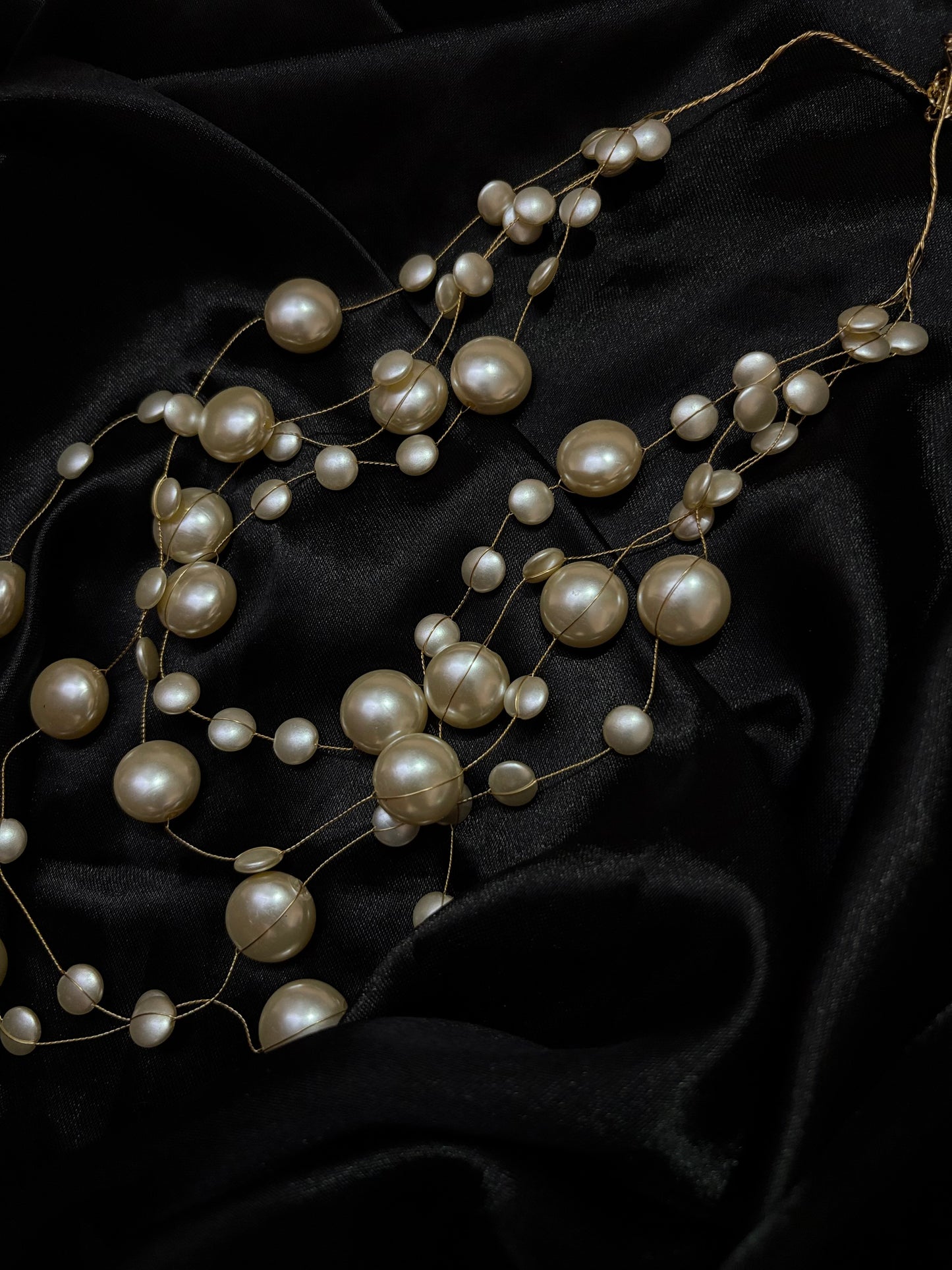 contemporary multistrand pearl neckpiece