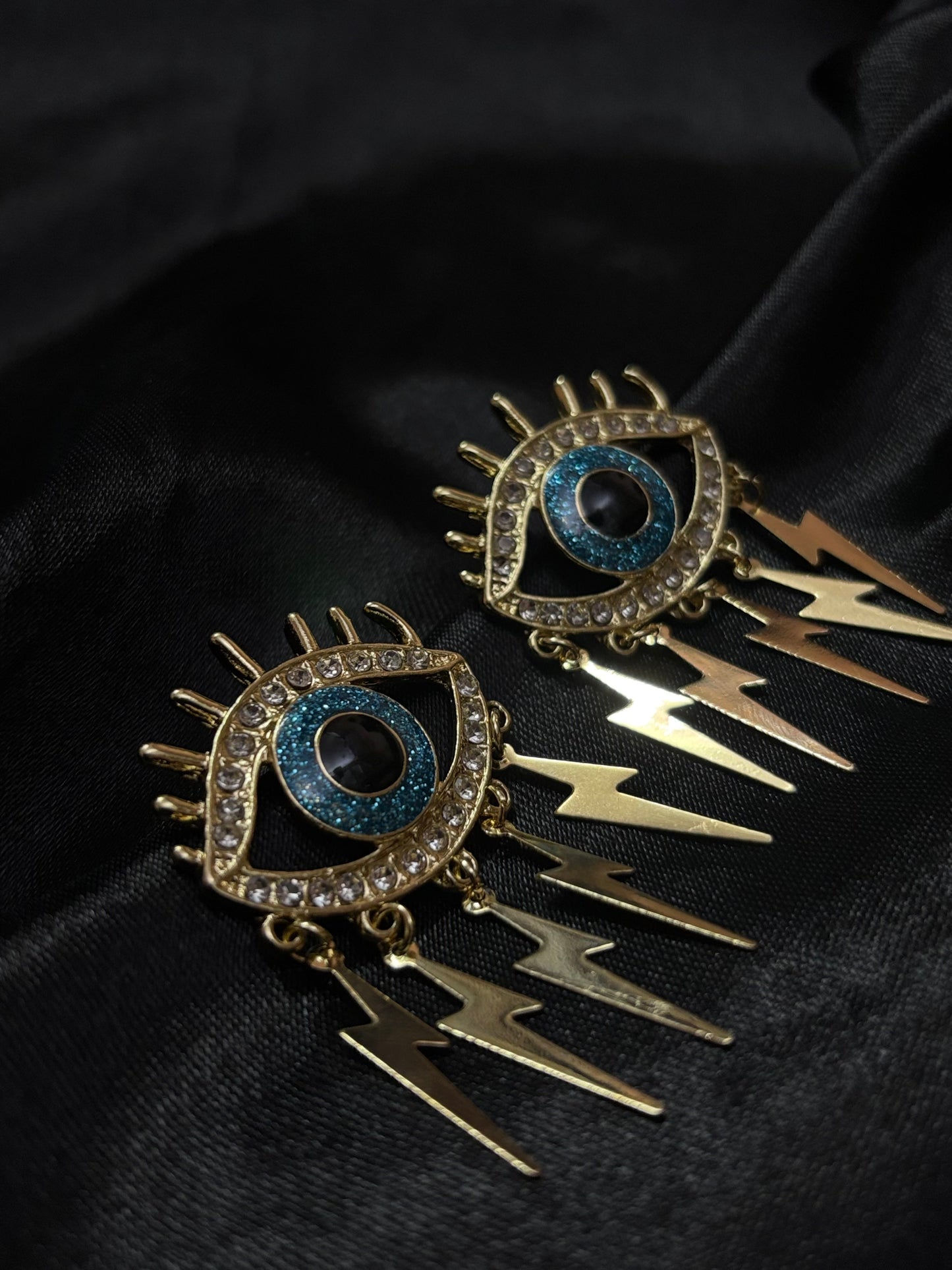 evil eye with current designed earring
