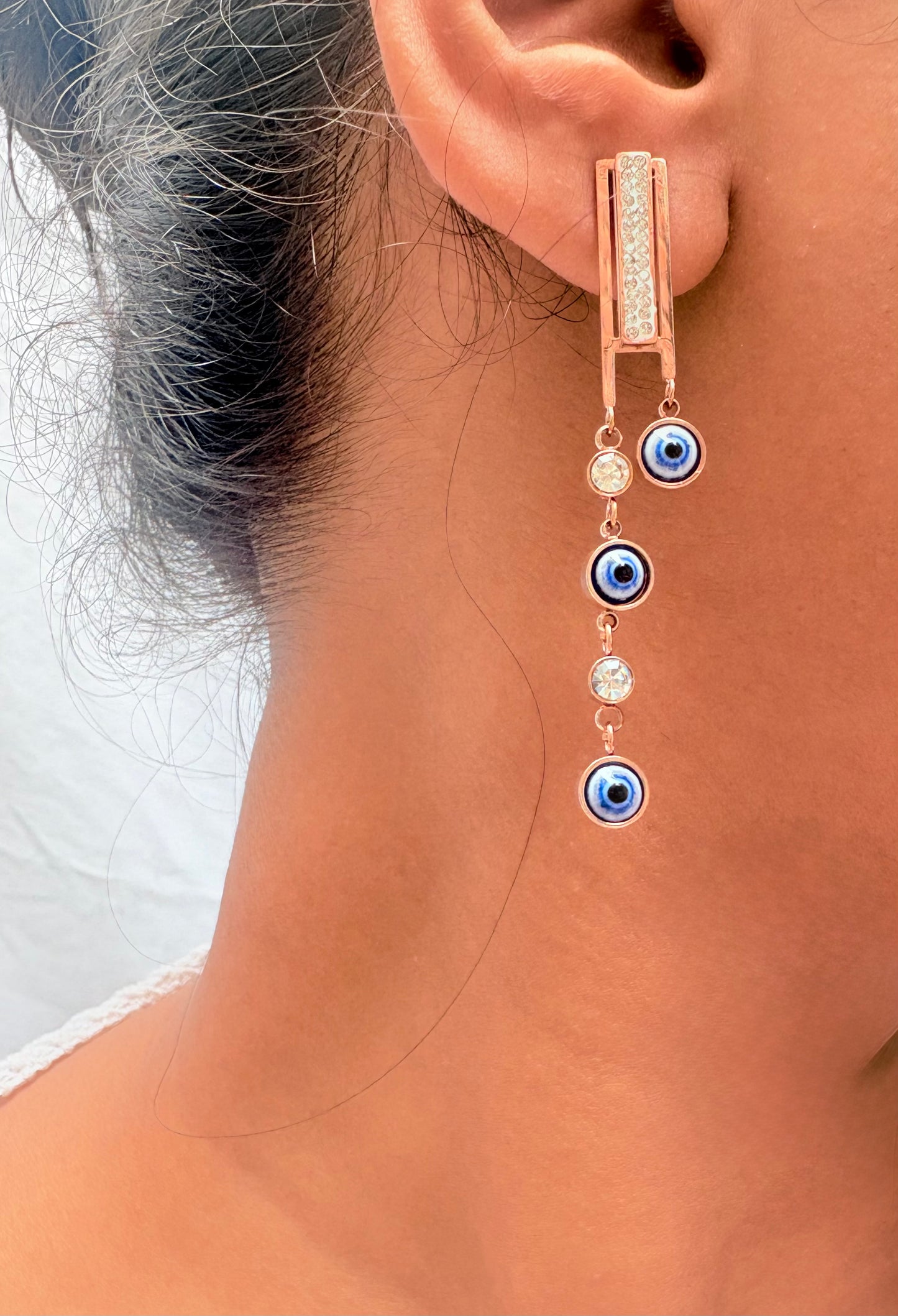 Tiny evil eye dangle