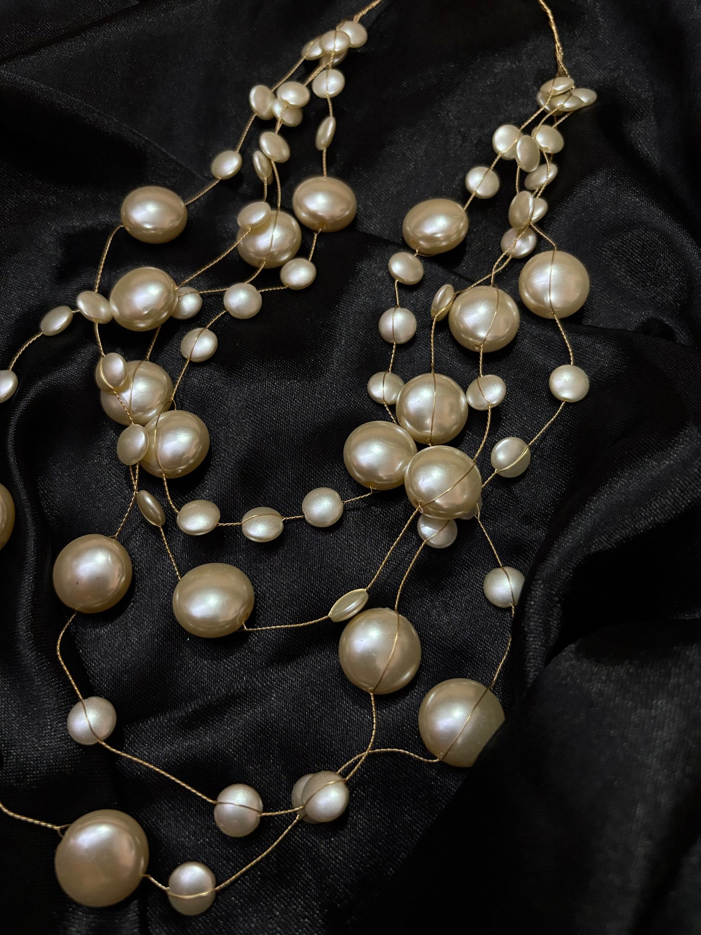 contemporary multistrand pearl neckpiece