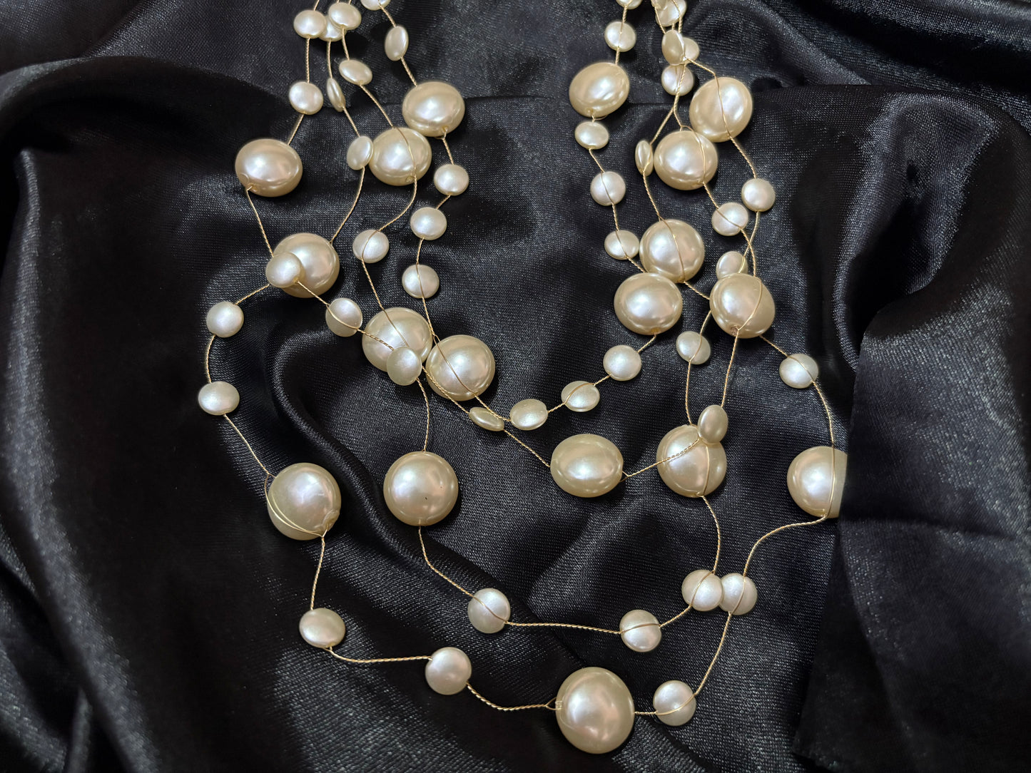 contemporary multistrand pearl neckpiece
