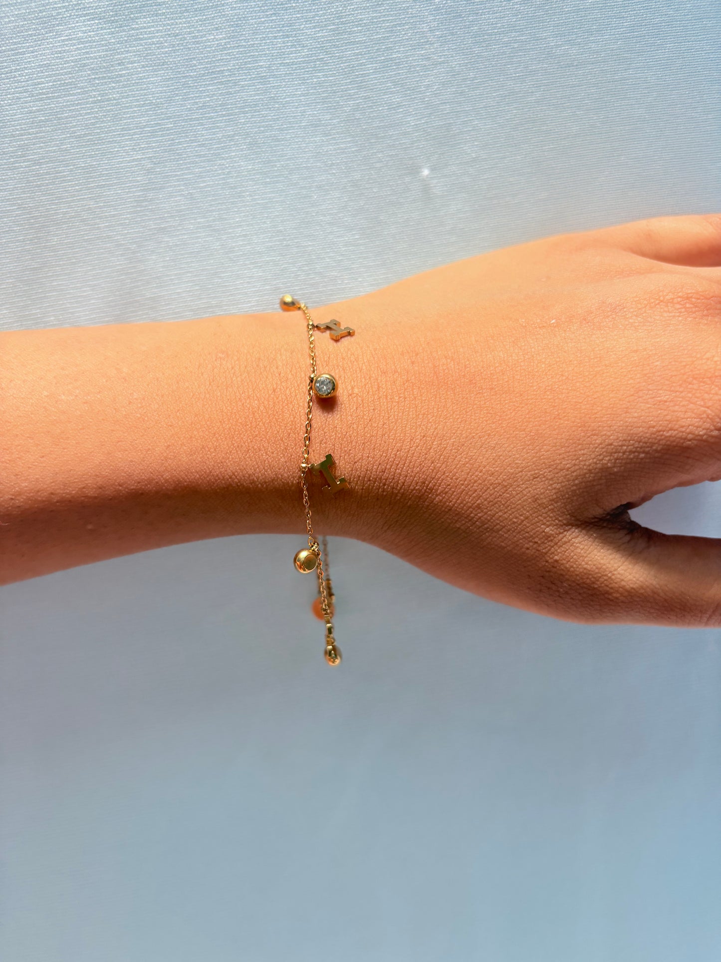 Delicate charms bracelet