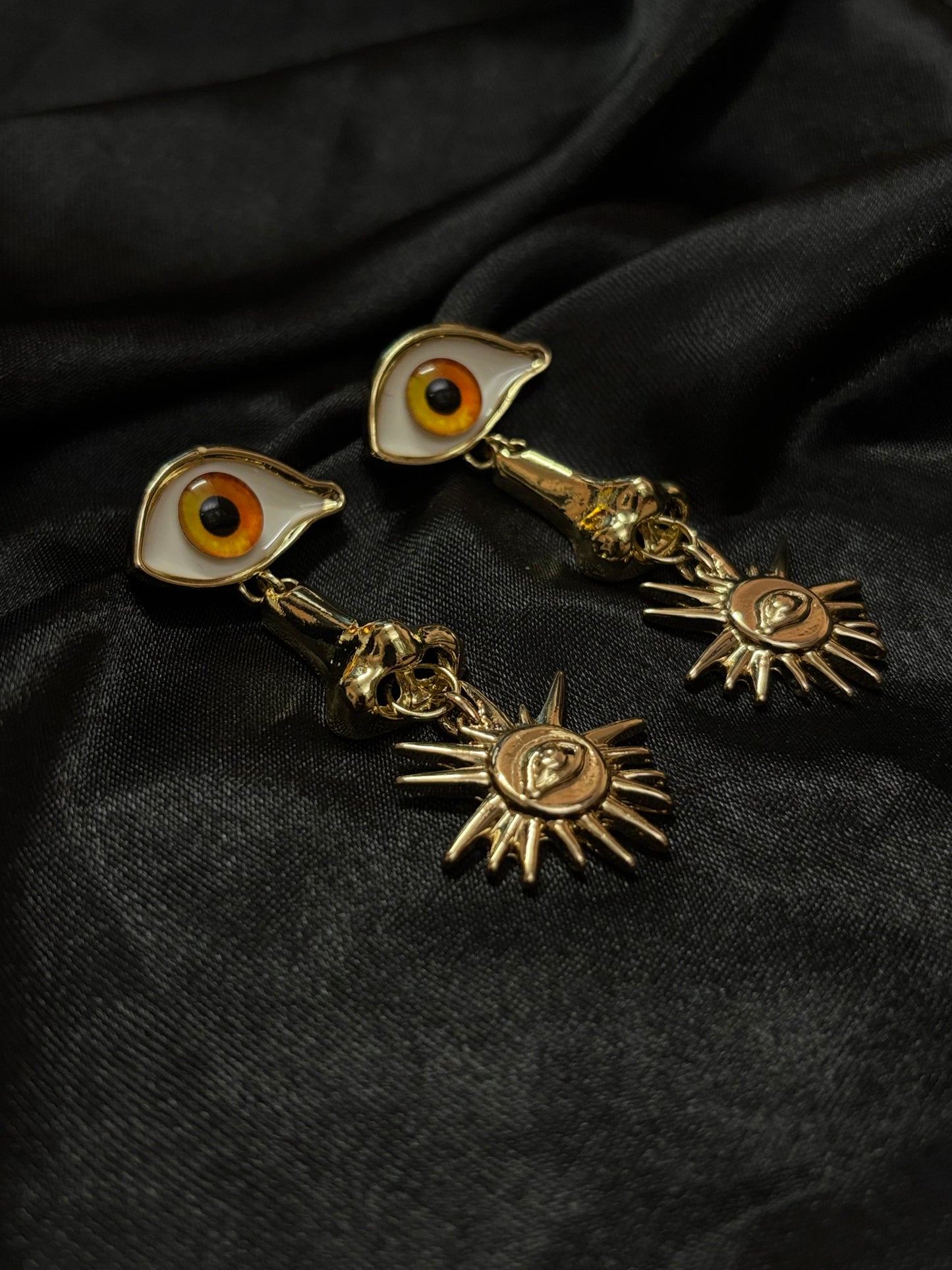 nose designed evil eye drop