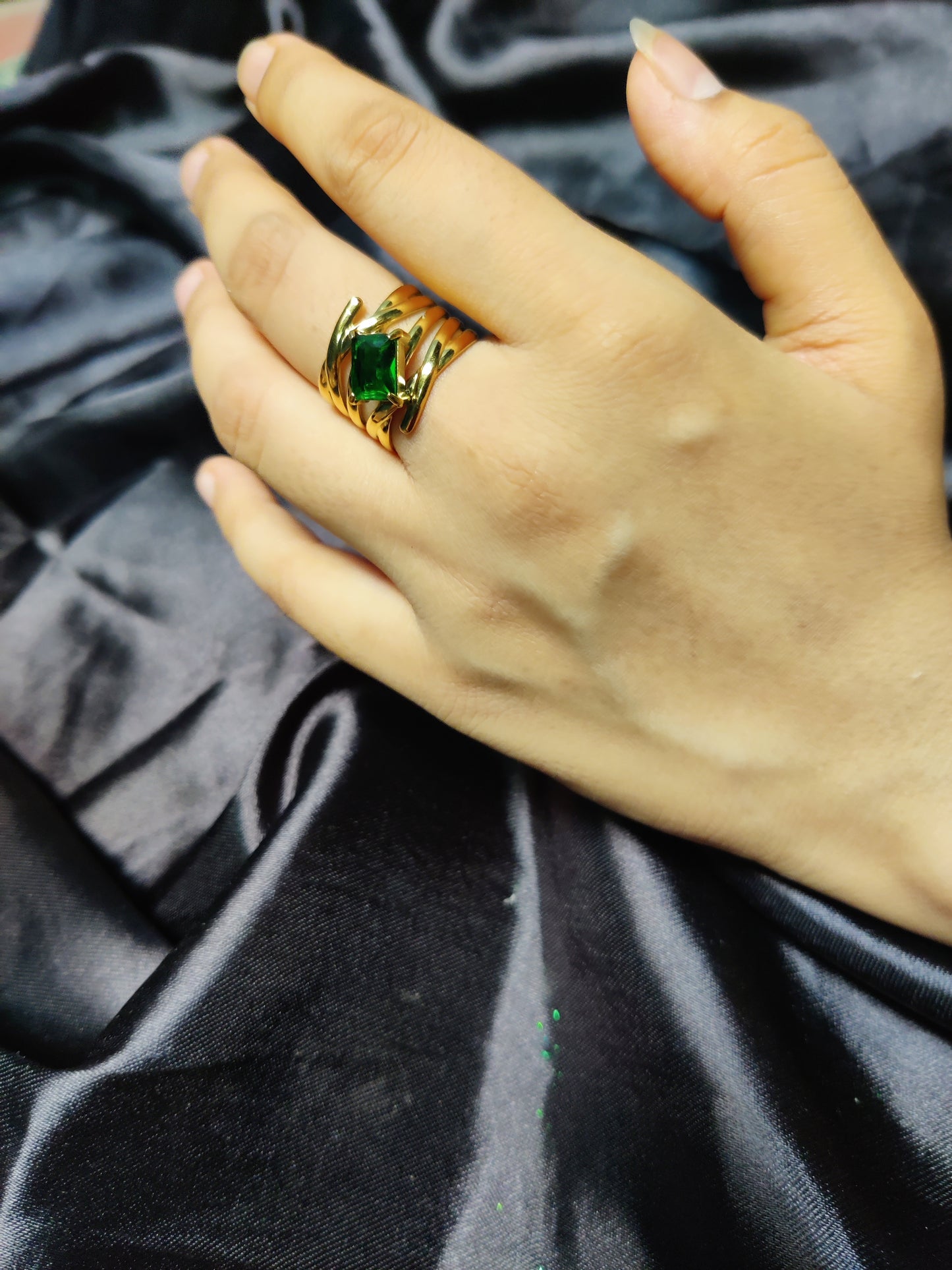 golden green stone ring