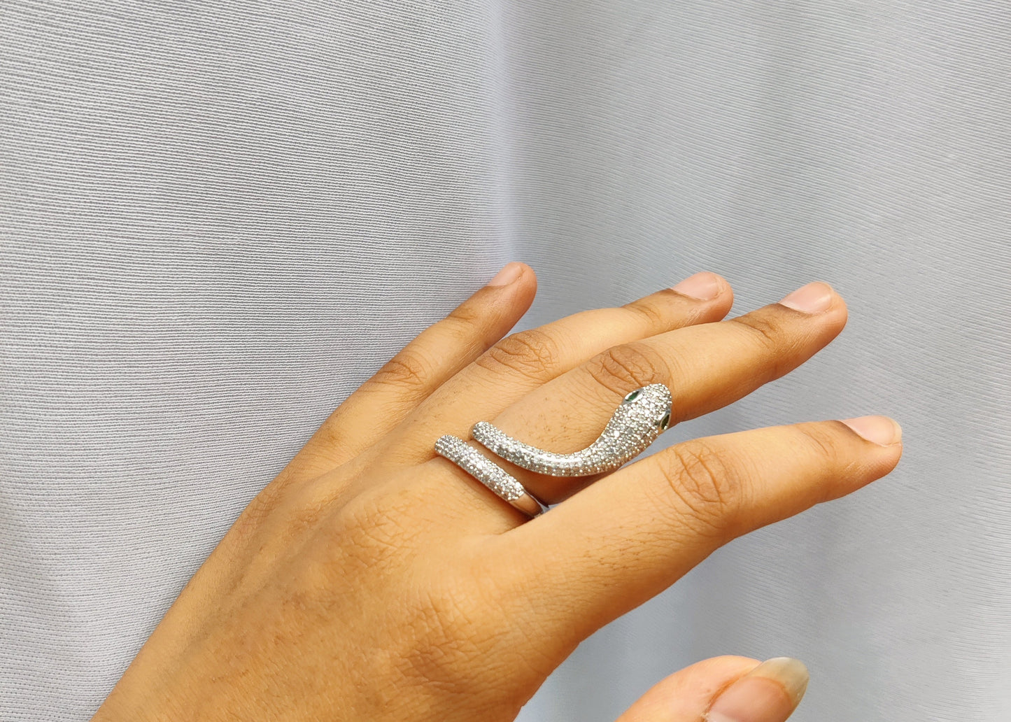 rounded serpent ring