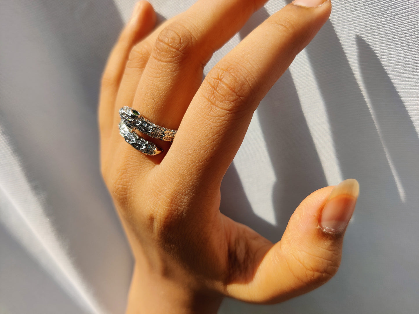 detailed serpenti stones ring