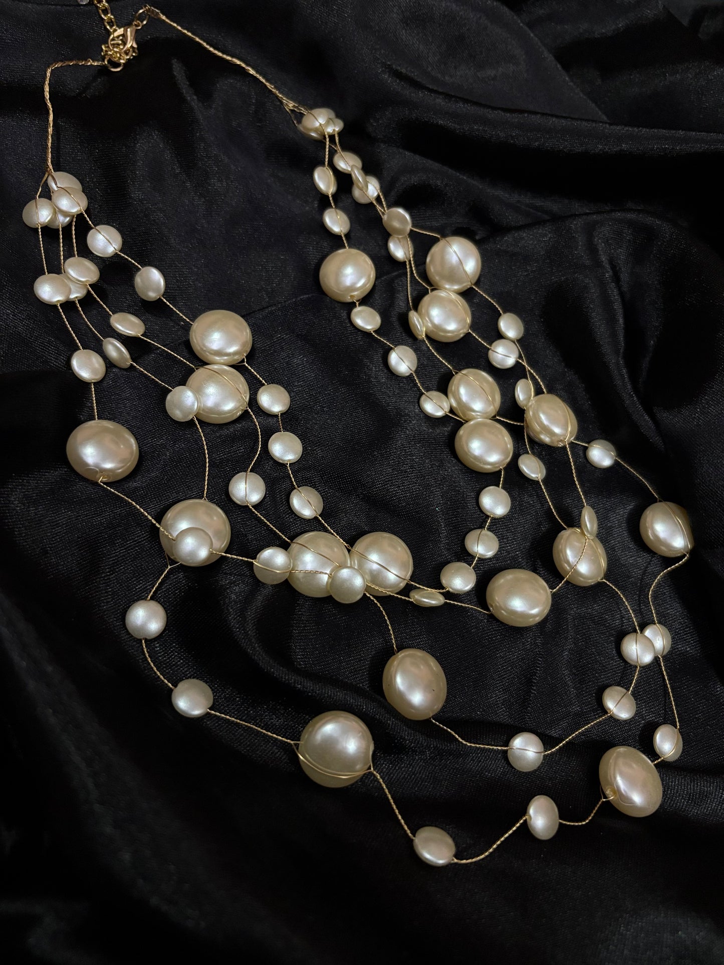 contemporary multistrand pearl neckpiece