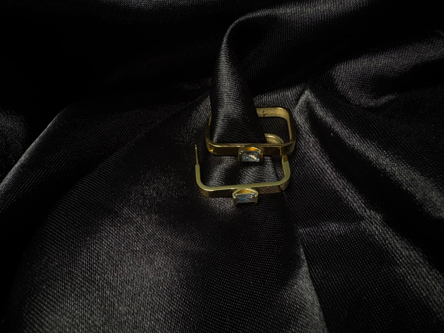 Square shaped edgy studs