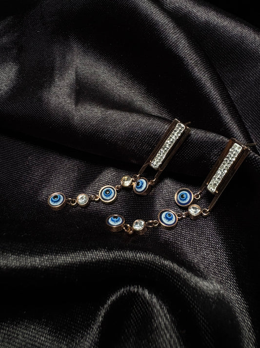 Tiny evil eye dangle