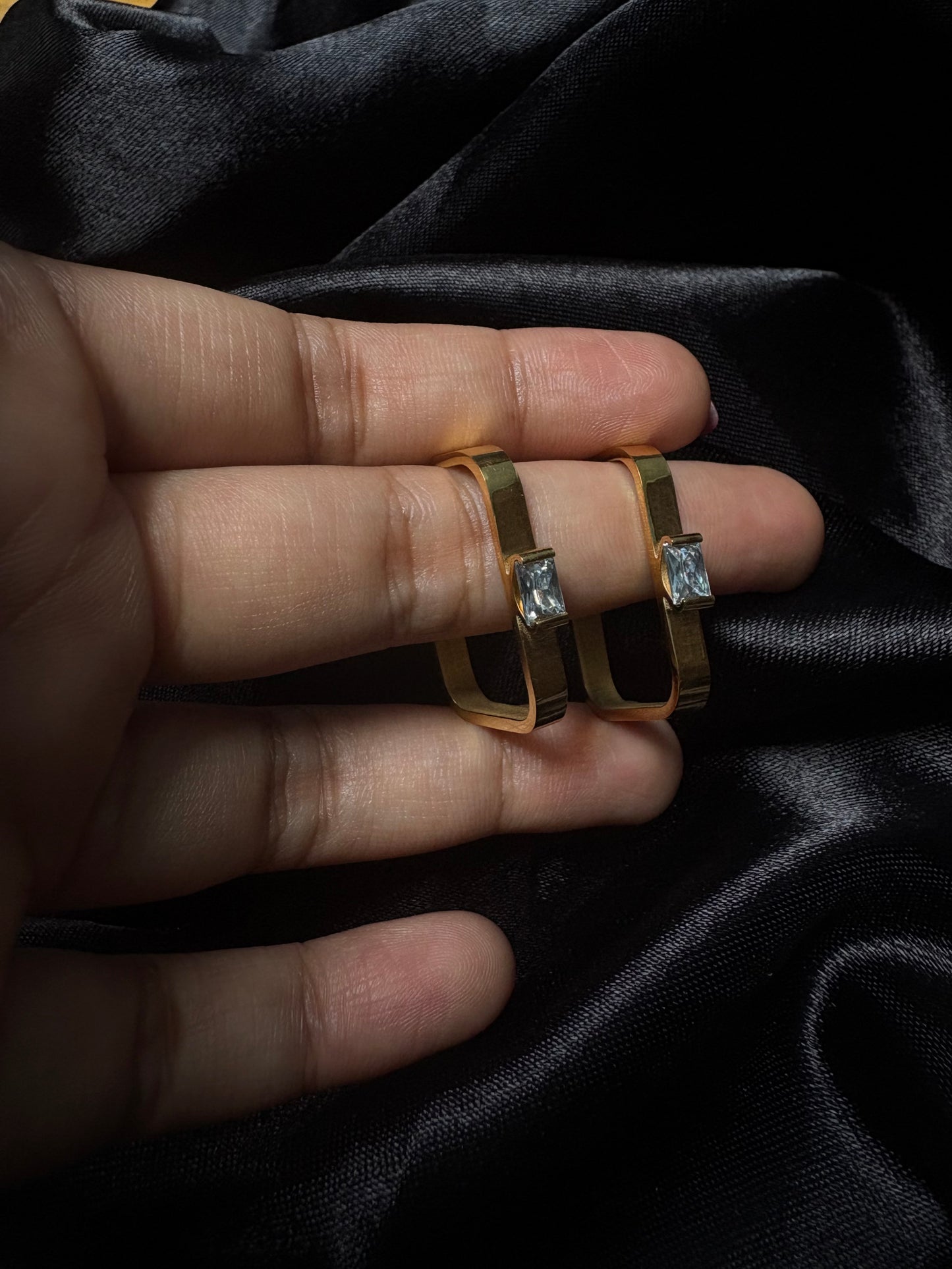 Square shaped edgy studs