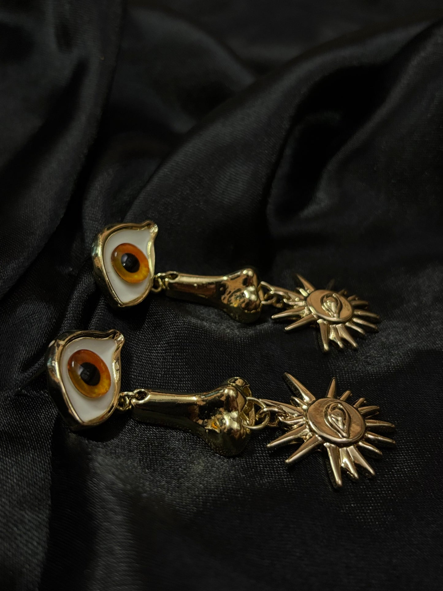 nose designed evil eye drop