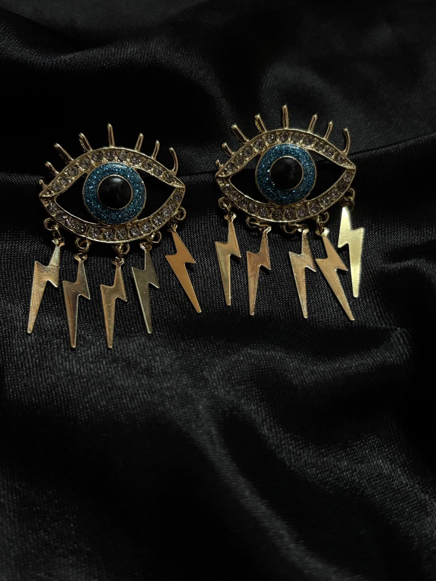 evil eye with current designed earring
