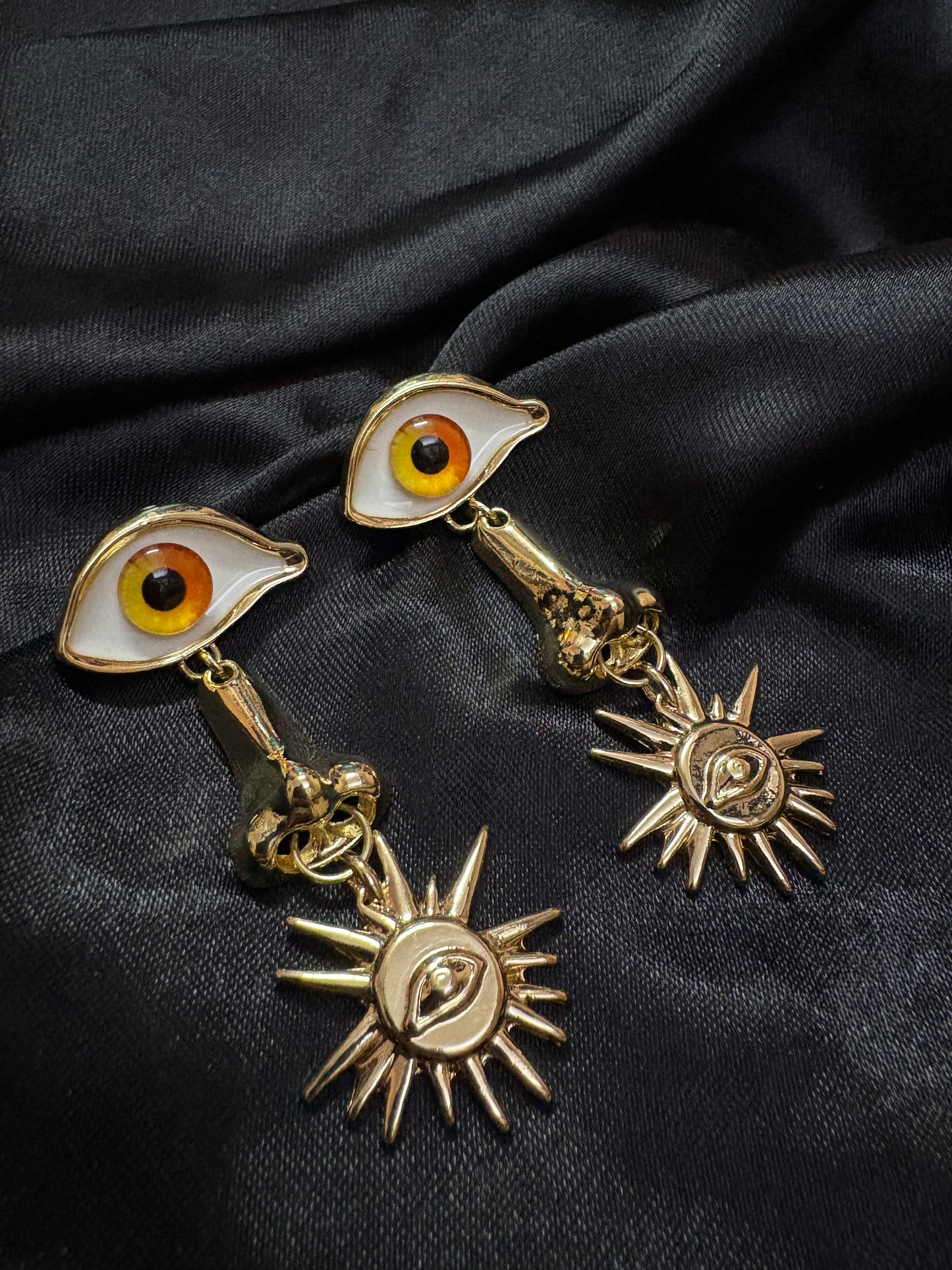 nose designed evil eye drop