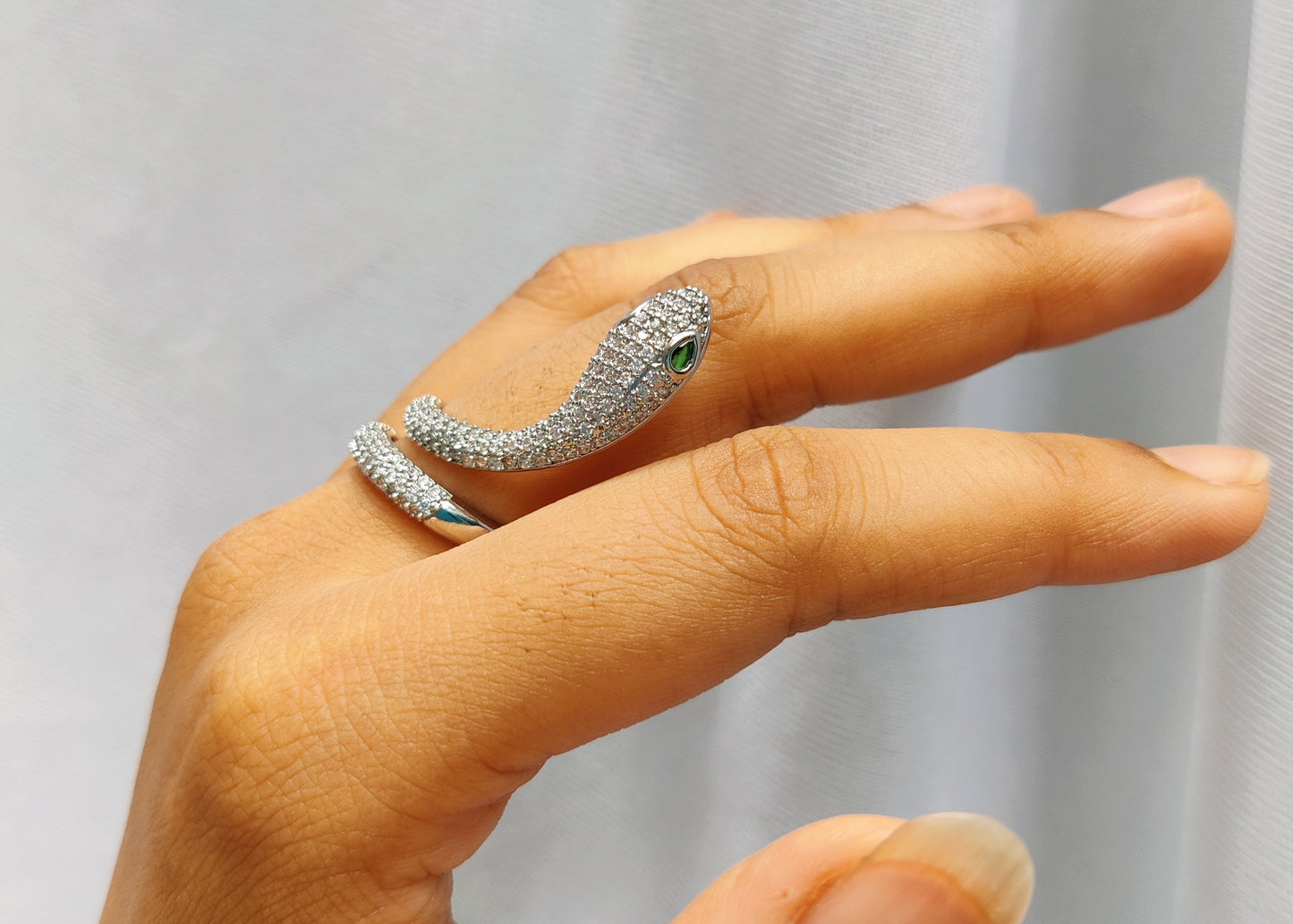rounded serpent ring